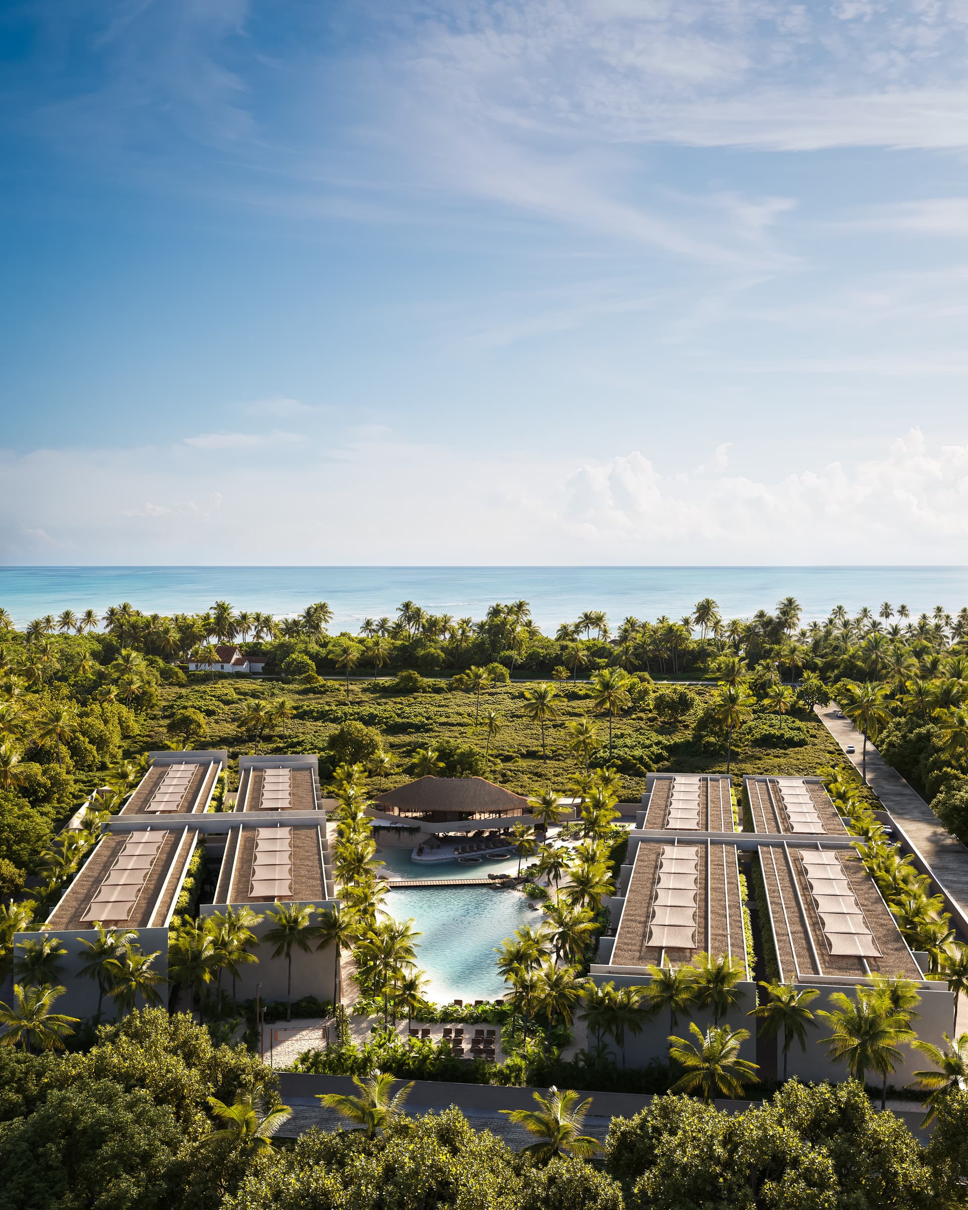 Vista lateral do empreendimento, destacando os dois pavilhões e a piscina