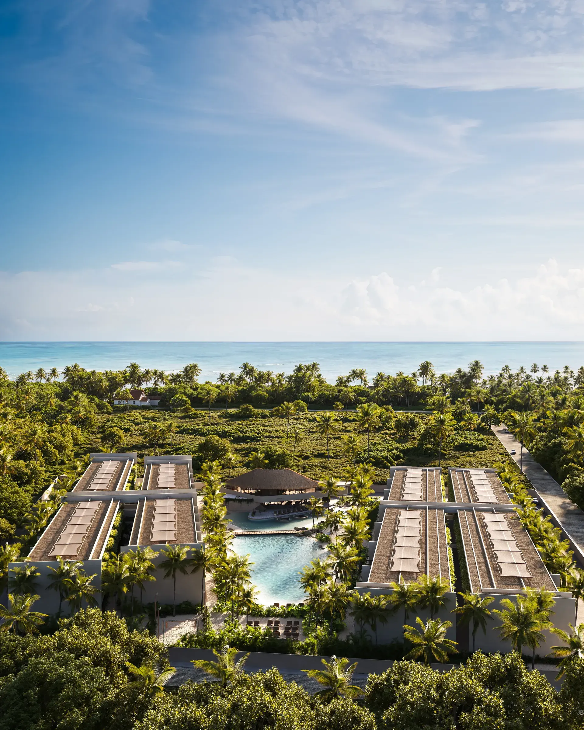 Vista lateral do empreendimento, destacando os dois pavilhões e a piscina